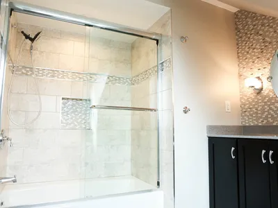 Lakeville Primary Bathroom Remodel with Mosaic Tile Wall – photo 9