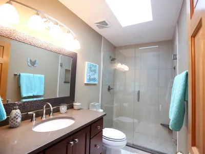 Lakeville Three-Bathroom Remodel with Sliding Barn Door – photo 10