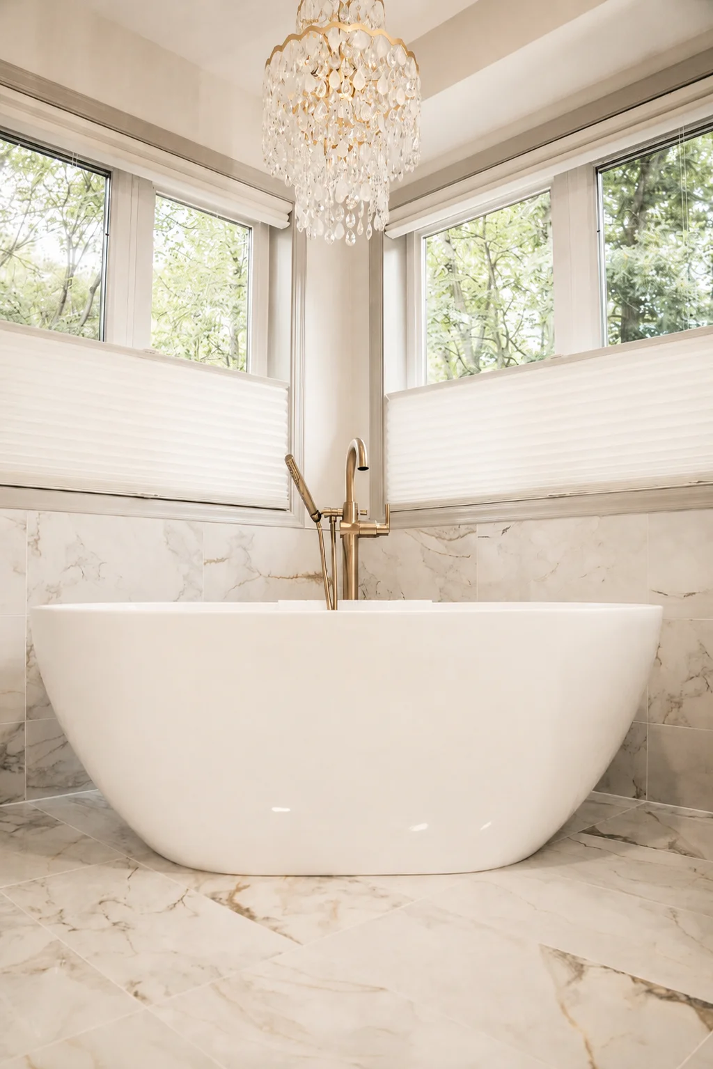 Freestanding soaking tub replacing corner tub in Burnsville primary bathroom remodel by Honey-Doers Remodeling